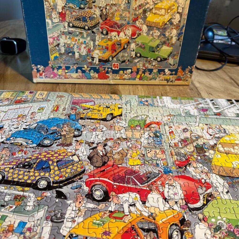 Jumbo brand 500 piece puzzle In the Car Repair Shop Jan Van Haasteren complete
